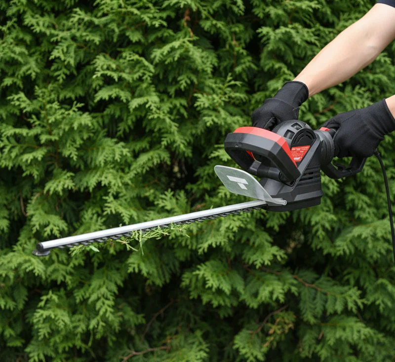 Taille-haie électrique 710W - lame 61cm - poignée arrière rotative