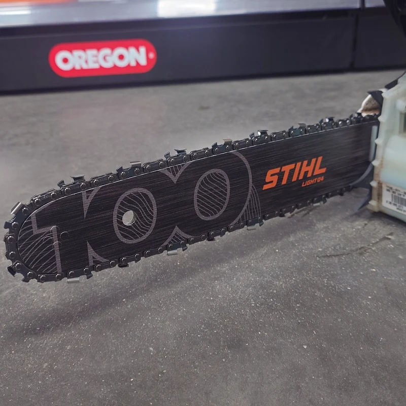 KIT GUIDE 35 CM 100 ANS STIHL + 4 CHAINES OREGON